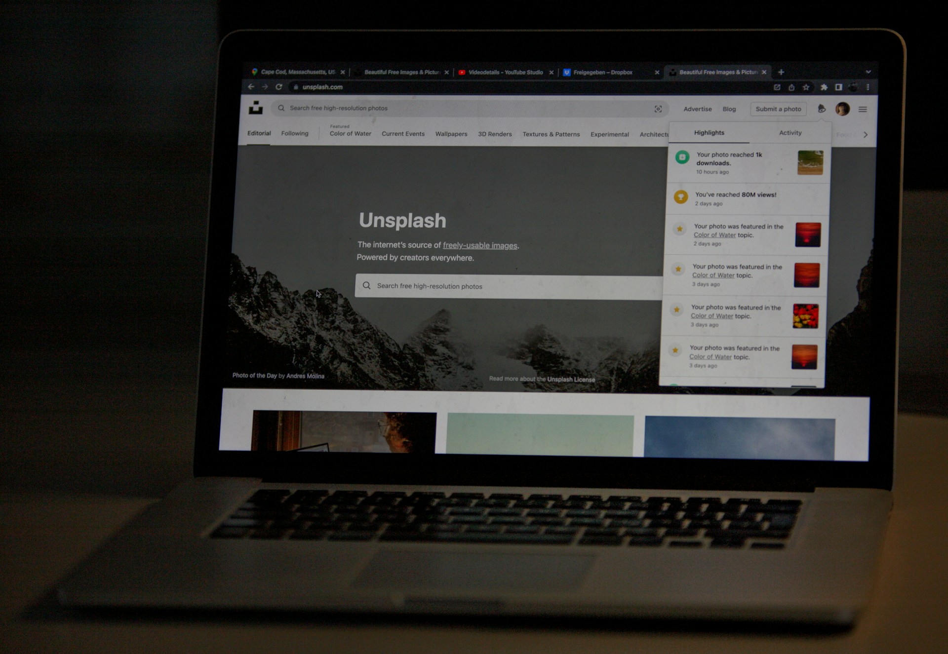 Unsplash website open on a laptop screen