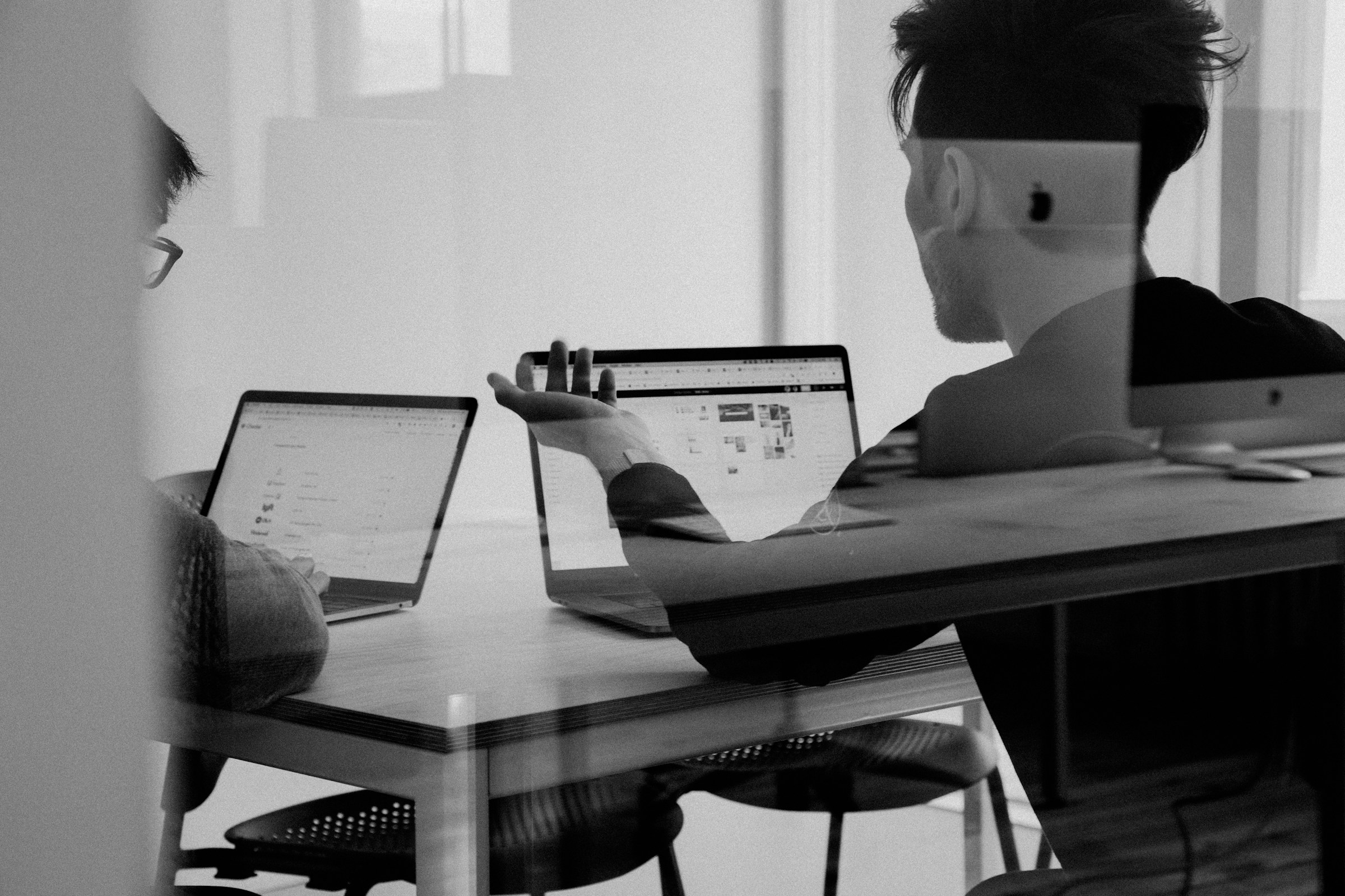 Black and white team meeting for TechAI marketing brand